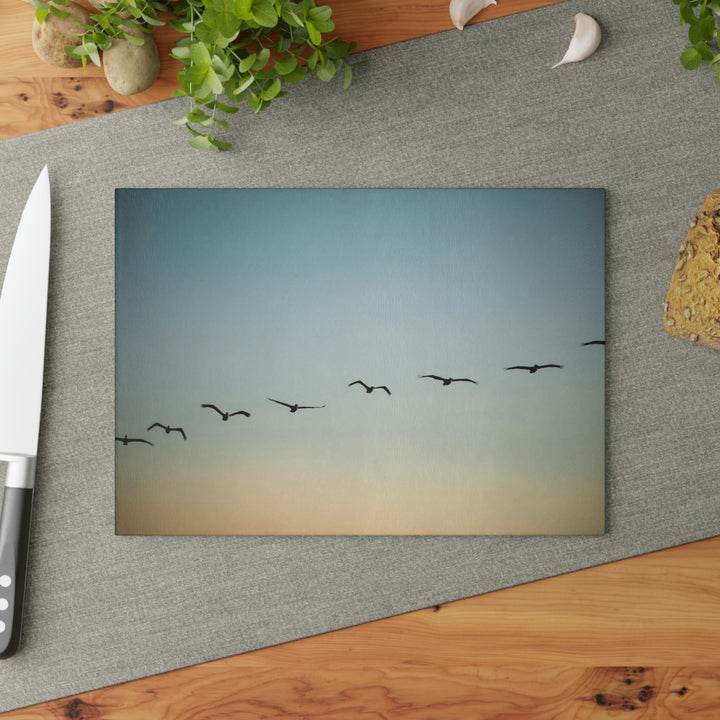 Brown Pelicans in Flight - Glass Cutting Board - Visiting This World